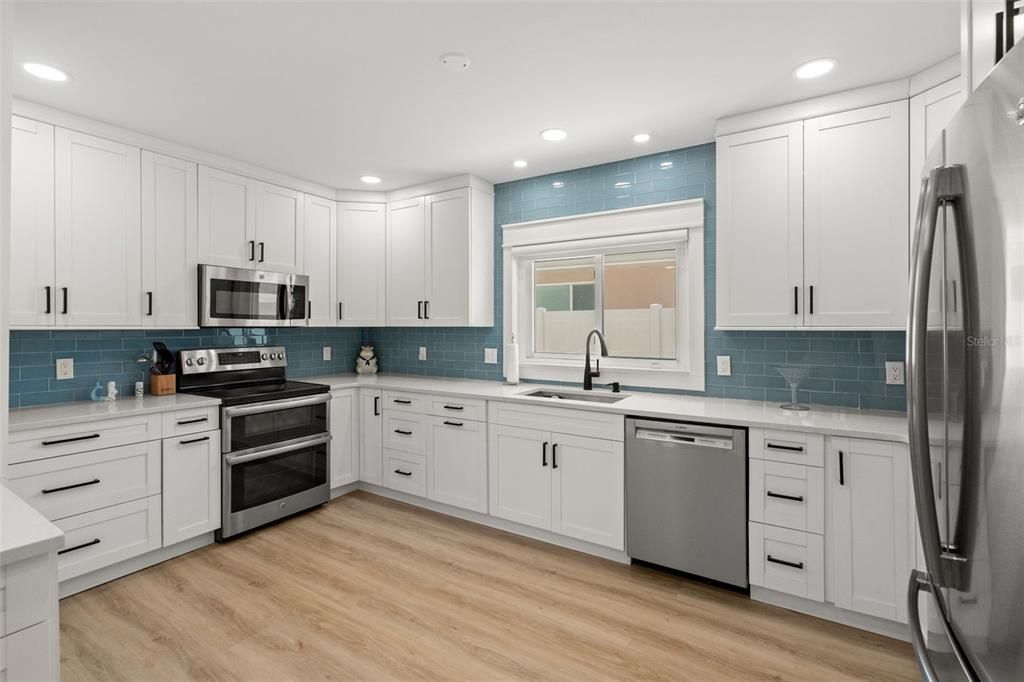 Interior, Kitchen, Recessed Lighting, Stainless Steel Appliances, Wood Texture Flooring