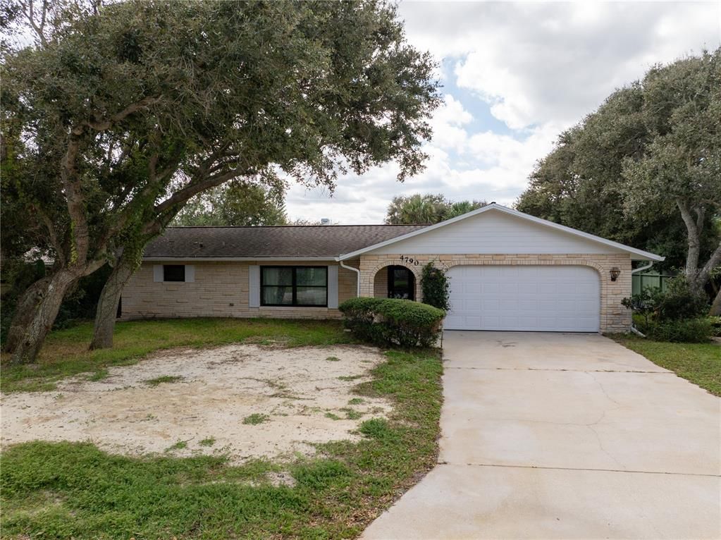 Attached, Backyard, Exterior, Facade, Brick Facade, Ranch