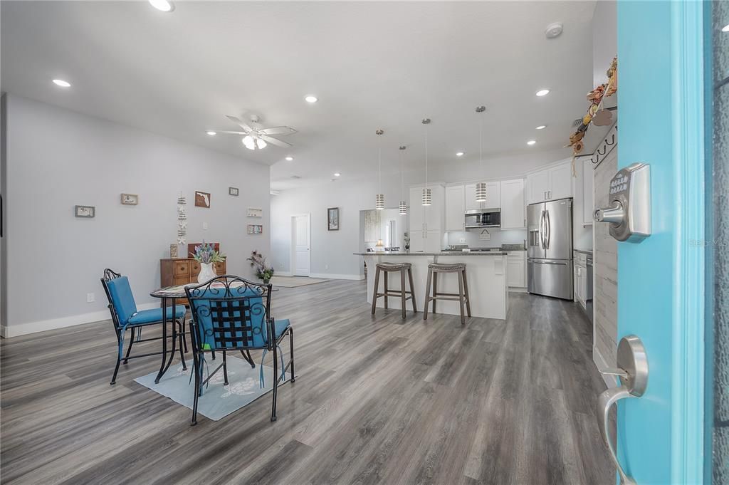 Dining room, Interior, Kitchen, Pendant Lights, Recessed Lighting, Stainless Steel Appliances, Wood Texture Flooring