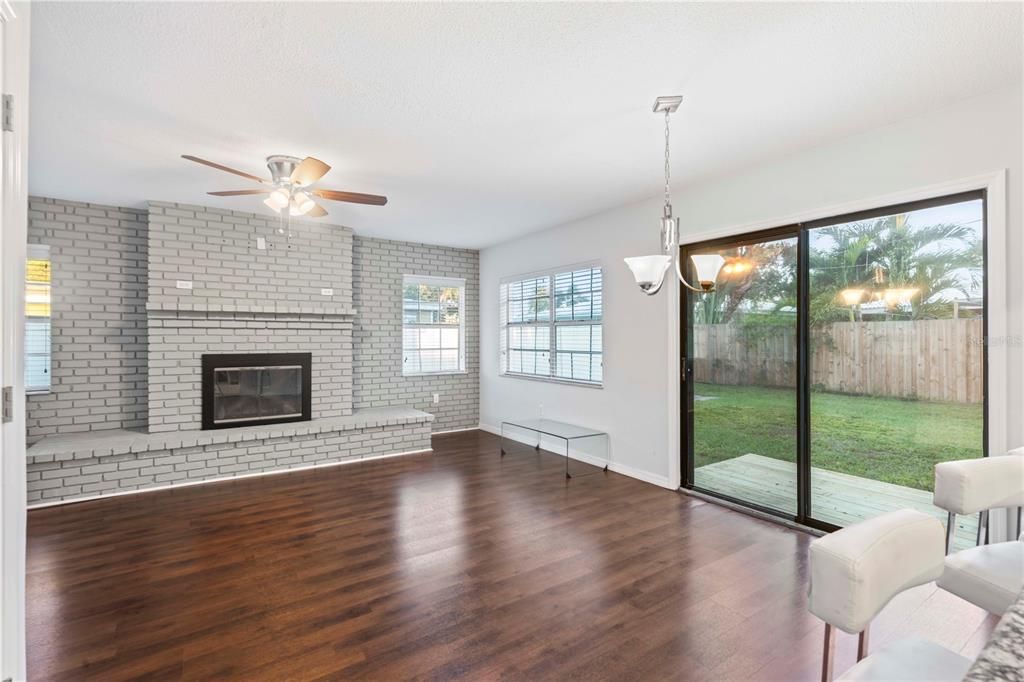 Empty room, Fireplace, Interior, Pendant Lights, Stone Walls, Wood Texture Flooring