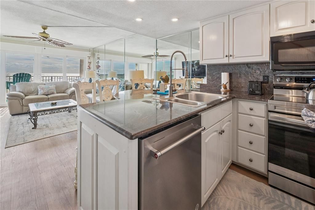 Interior, Kitchen, Living room, Recessed Lighting, Stainless Steel Appliances, Wood Texture Flooring