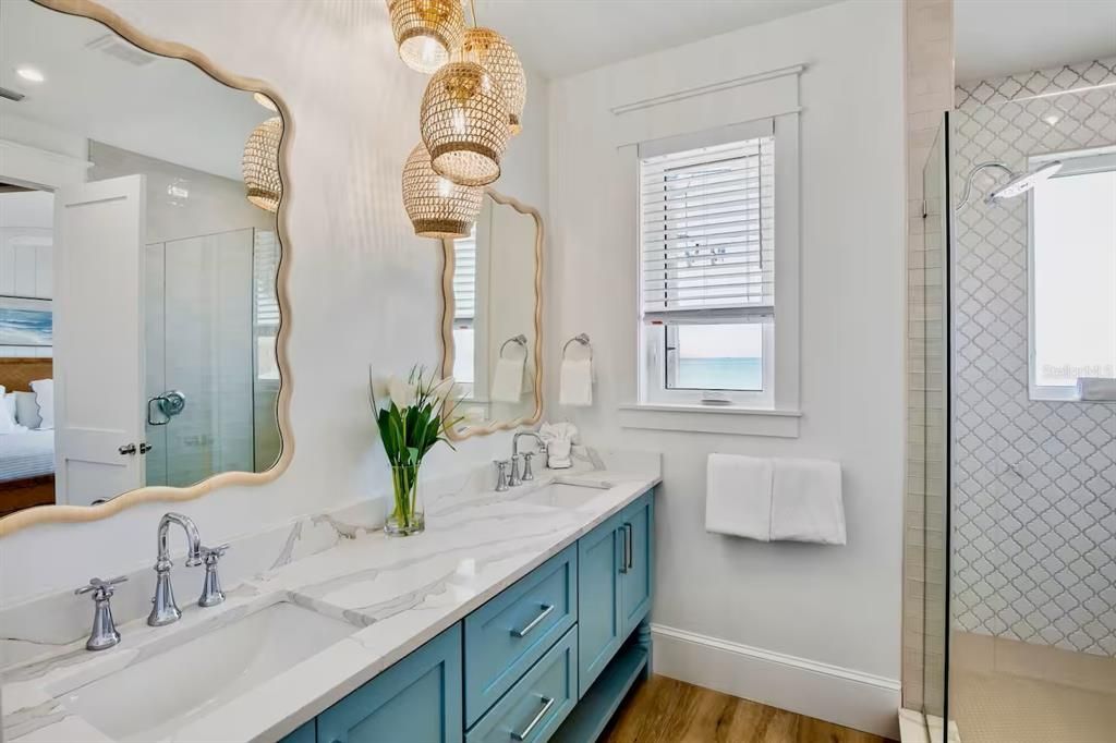 Bathroom, Dual Sink Vanities, Glass Shower, Interior, Recessed Lighting, Wood Texture Flooring