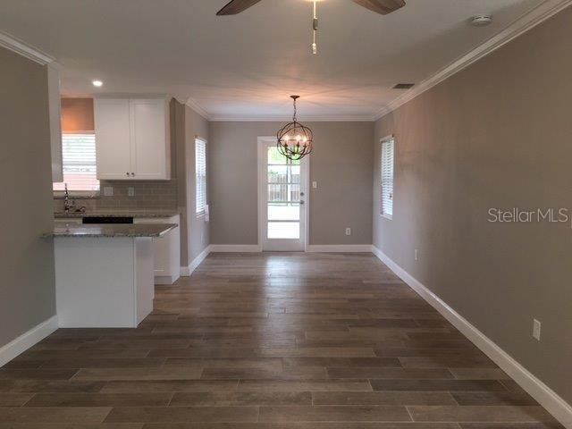 Chandelier, Empty room, Interior, Kitchen, Recessed Lighting, Wood Texture Flooring