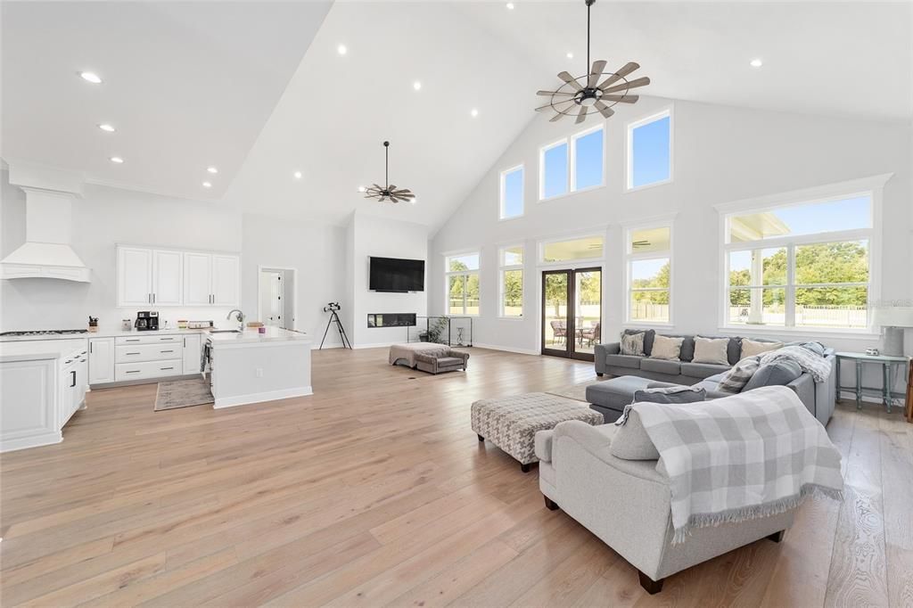 Fireplace, Interior, Kitchen, Living room, Pendant Lights, Recessed Lighting, Wood Texture Flooring