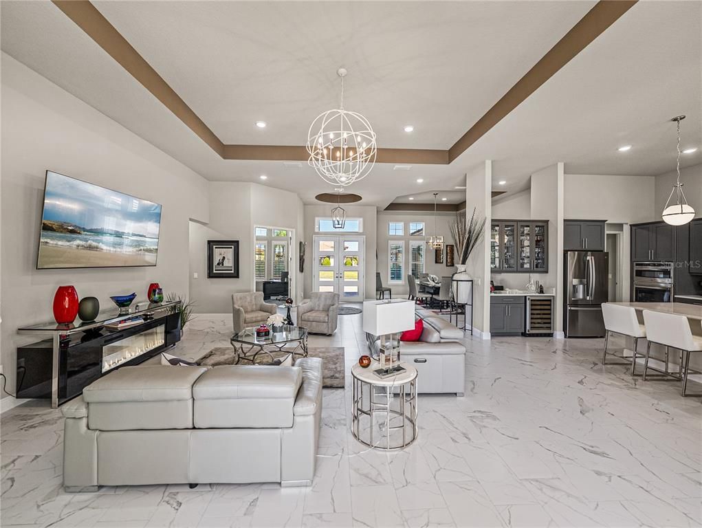 Chandelier, Interior, Kitchen, Living room, Marble, Pendant Lights, Recessed Lighting, Stainless Steel Appliances