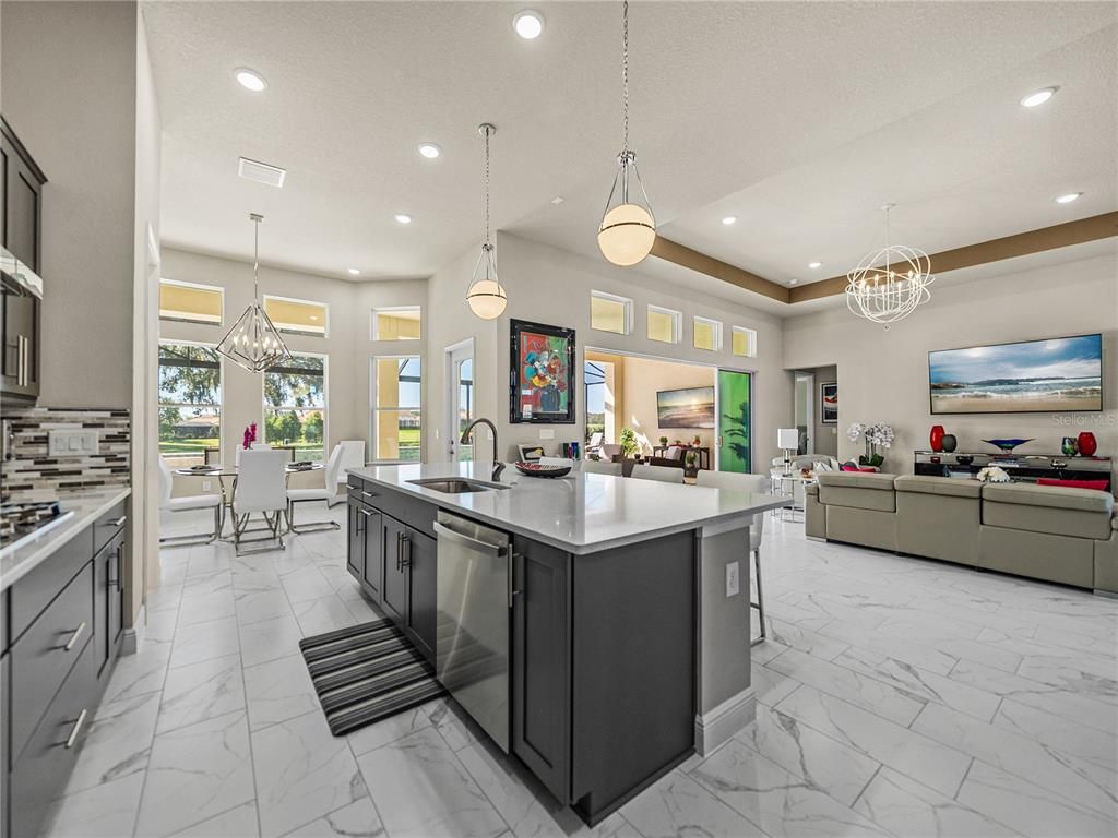 Chandelier, Dining room, Interior, Kitchen, Living room, Marble, Pendant Lights, Recessed Lighting, Stainless Steel Appliances