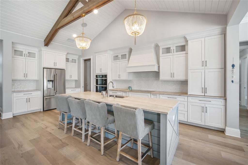 Chandelier, Interior, Kitchen, Pendant Lights, Stainless Steel Appliances, Wooden Beams, Wood Texture Flooring