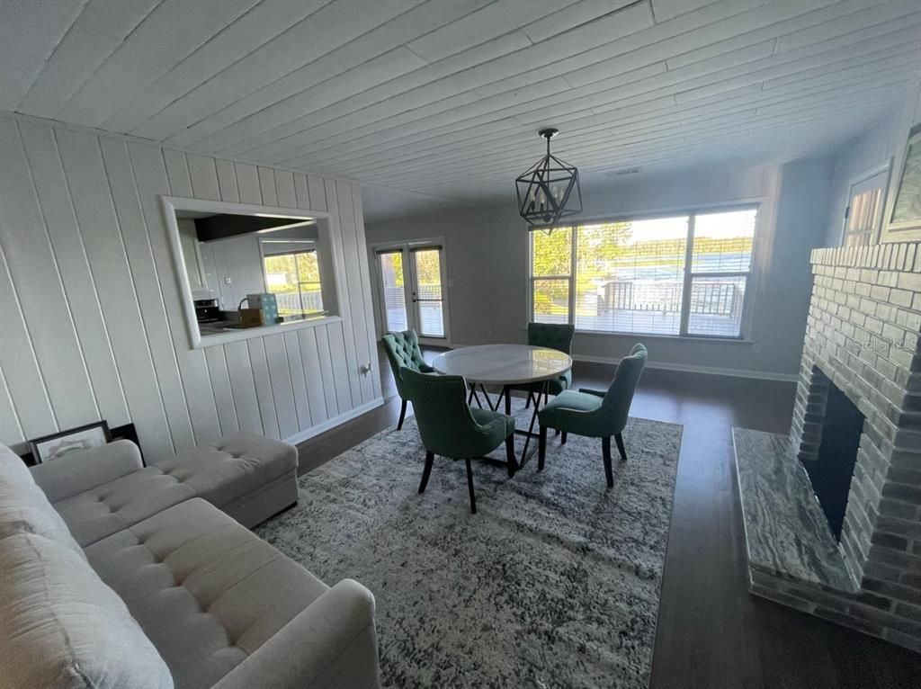 Dining room, Fireplace, Interior, Living room, Pendant Lights, Wood Texture Flooring