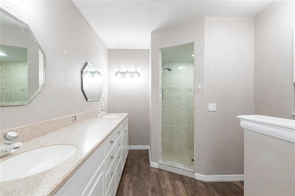 Bathroom, Dual Sink Vanities, Glass Shower, Interior, Wood Texture Flooring