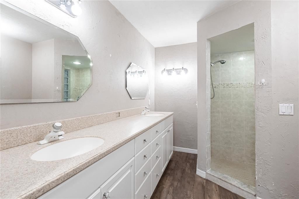 Bathroom, Dual Sink Vanities, Glass Shower, Interior, Wood Texture Flooring
