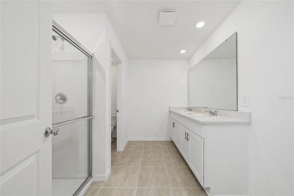 Bathroom, Dual Sink Vanities, Glass Shower, Interior, Recessed Lighting