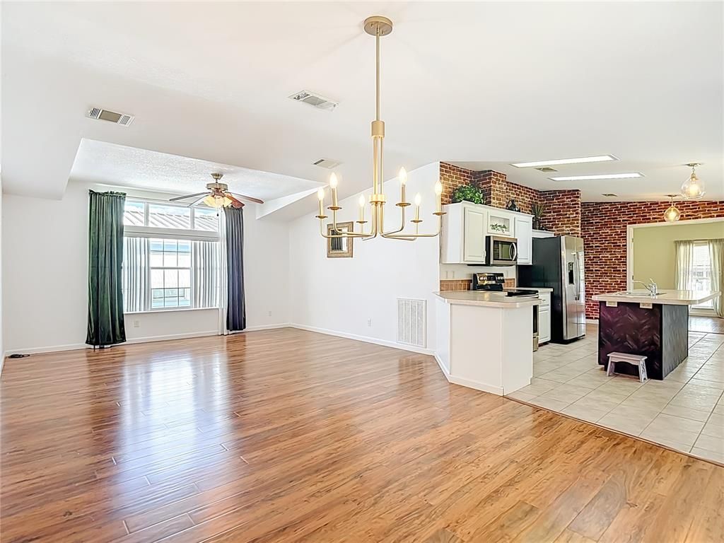 Chandelier, Empty room, Interior, Kitchen, Pendant Lights, Stone Walls, Wood Texture Flooring