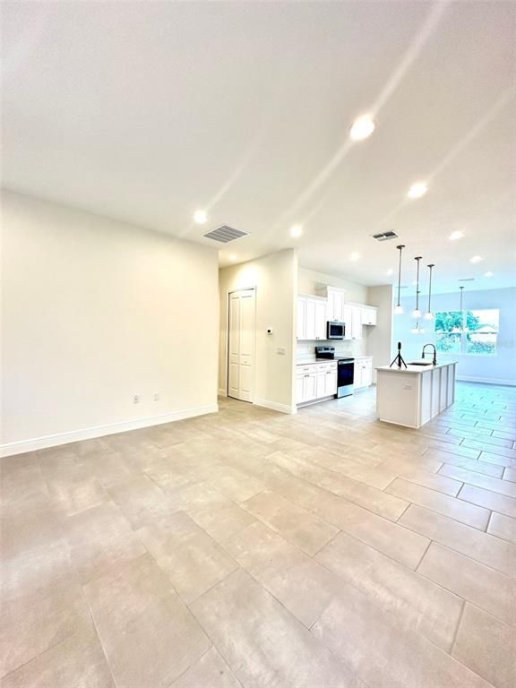 Empty room, Interior, Kitchen, Pendant Lights, Recessed Lighting, Stainless Steel Appliances
