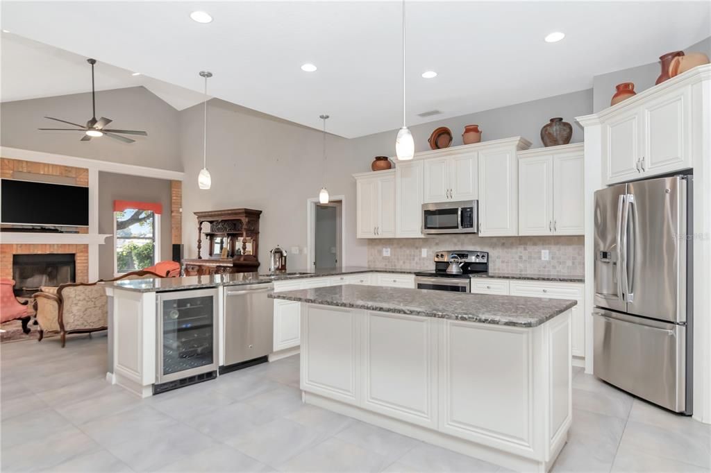 Fireplace, Interior, Kitchen, Pendant Lights, Recessed Lighting, Stainless Steel Appliances