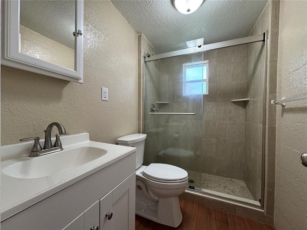 Bathroom, Glass Shower, Interior, Wood Texture Flooring