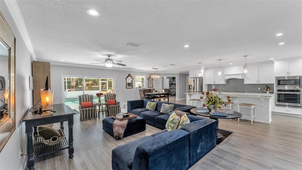 Dining room, Interior, Kitchen, Living room, Pendant Lights, Recessed Lighting, Stainless Steel Appliances, Wood Texture Flooring