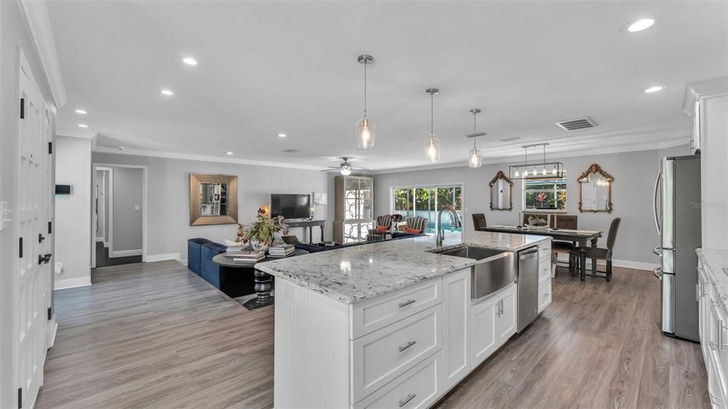 Dining room, Interior, Kitchen, Living room, Pendant Lights, Recessed Lighting, Stainless Steel Appliances, Wood Texture Flooring