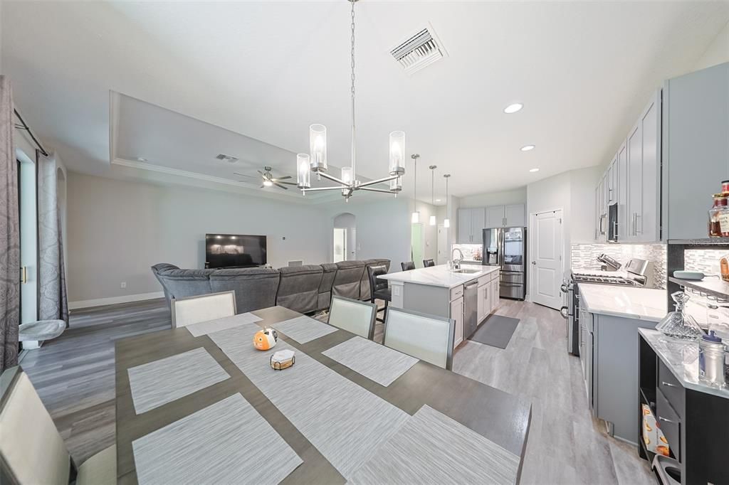 Dining room, Interior, Kitchen, Living room, Pendant Lights, Recessed Lighting, Wood Texture Flooring