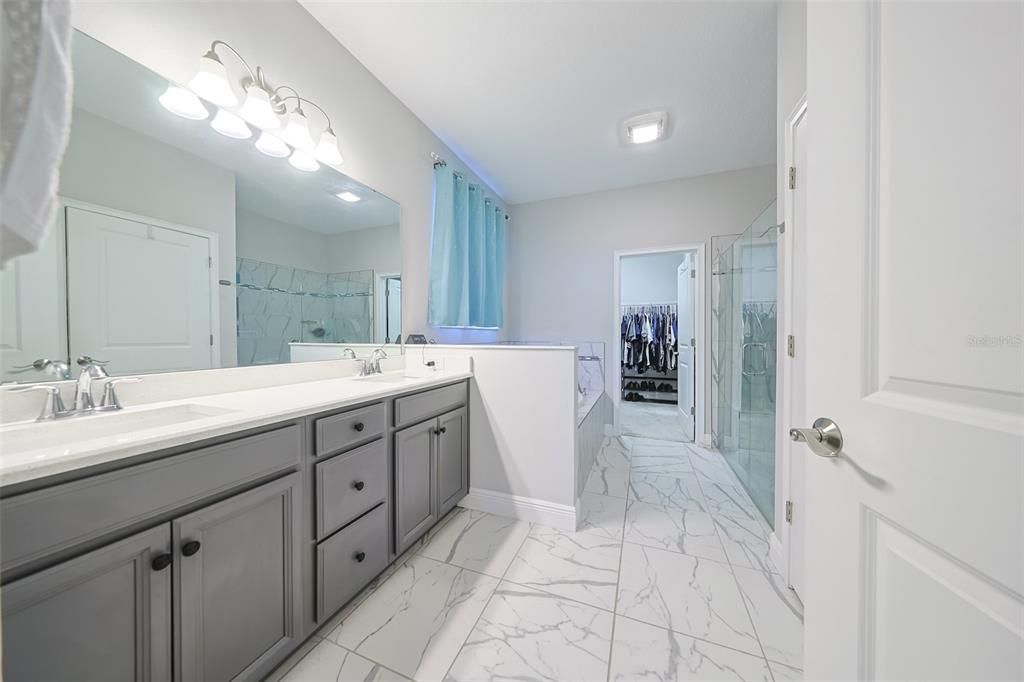 Bathroom, Dual Sink Vanities, Glass Shower, Interior, Marble, Recessed Lighting