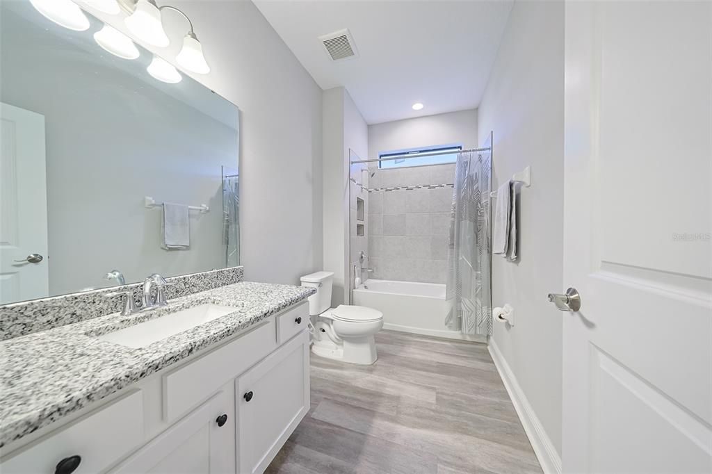 Bathroom, Dual Sink Vanities, Interior, Recessed Lighting, Wood Texture Flooring
