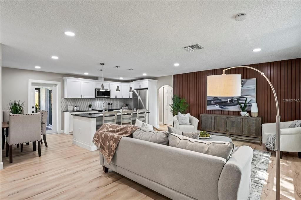 Dining room, Interior, Kitchen, Living room, Pendant Lights, Recessed Lighting, Stainless Steel Appliances, Wood Texture Flooring