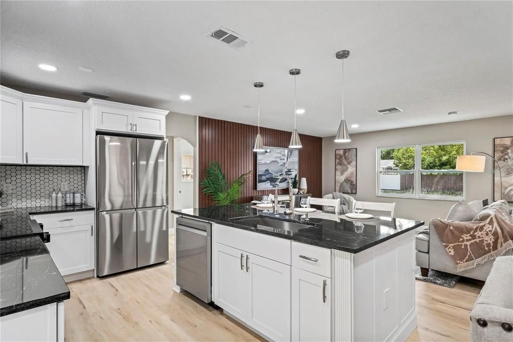 Dining room, Interior, Kitchen, Pendant Lights, Recessed Lighting, Stainless Steel Appliances, Wood Texture Flooring