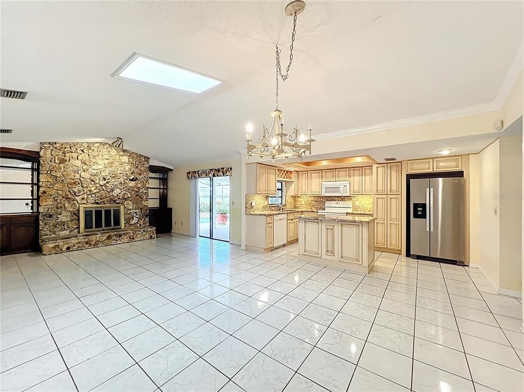 Chandelier, Fireplace, Interior, Kitchen, Stainless Steel Appliances, Stone Walls