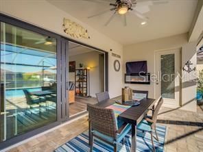 Dining room, Interior, Pool, Recessed Lighting, Sun Room, Wood Texture Flooring