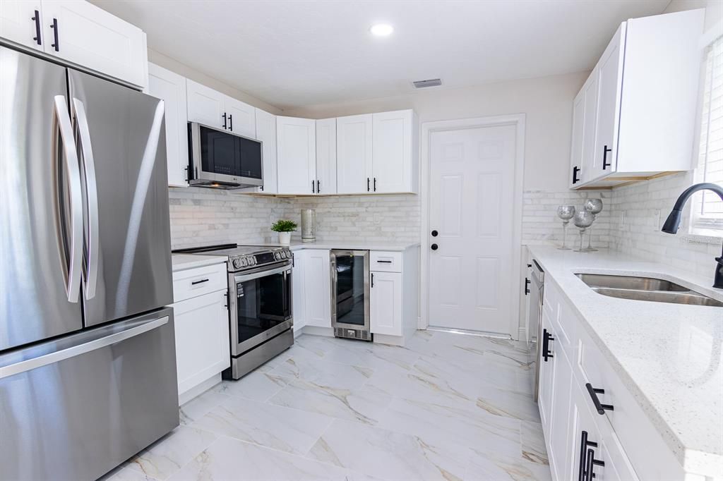 Interior, Kitchen, Marble, Recessed Lighting, Stainless Steel Appliances