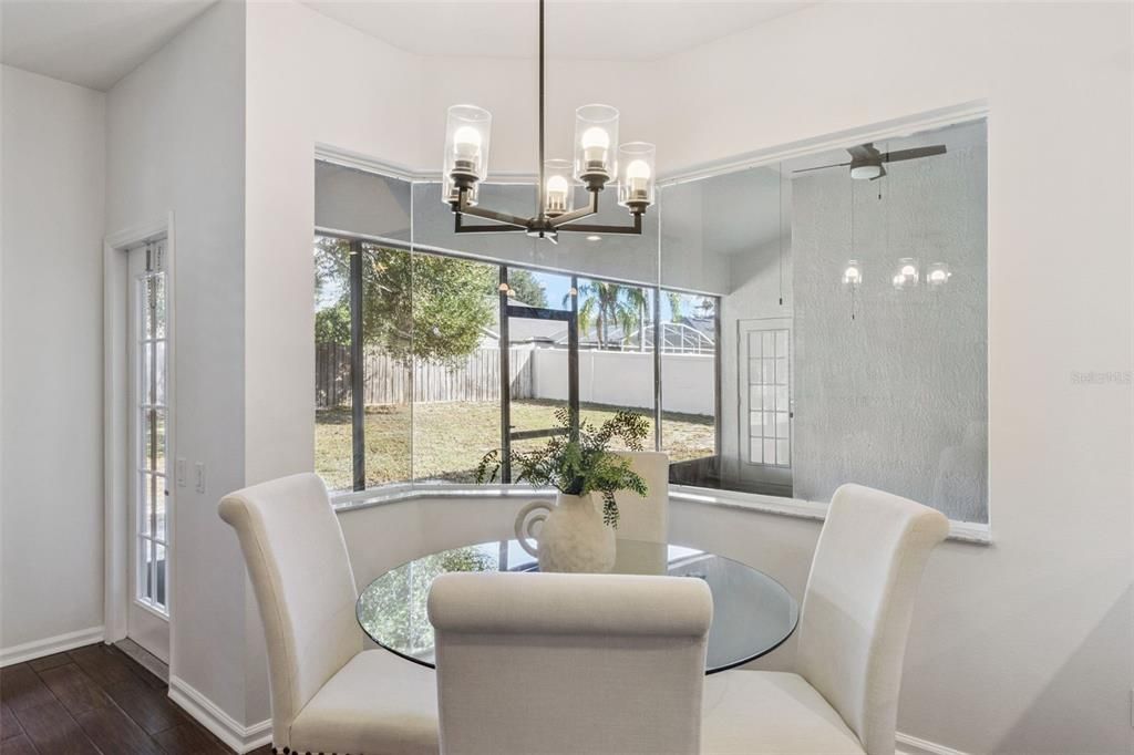 Chandelier, Dining room, Interior, Pendant Lights, Wood Texture Flooring