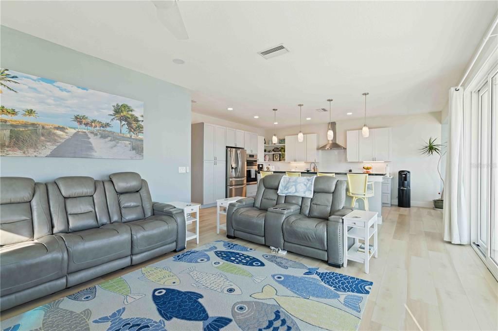 Home Theatre Room, Interior, Kitchen, Living room, Pendant Lights, Recessed Lighting, Stainless Steel Appliances, Wood Texture Flooring