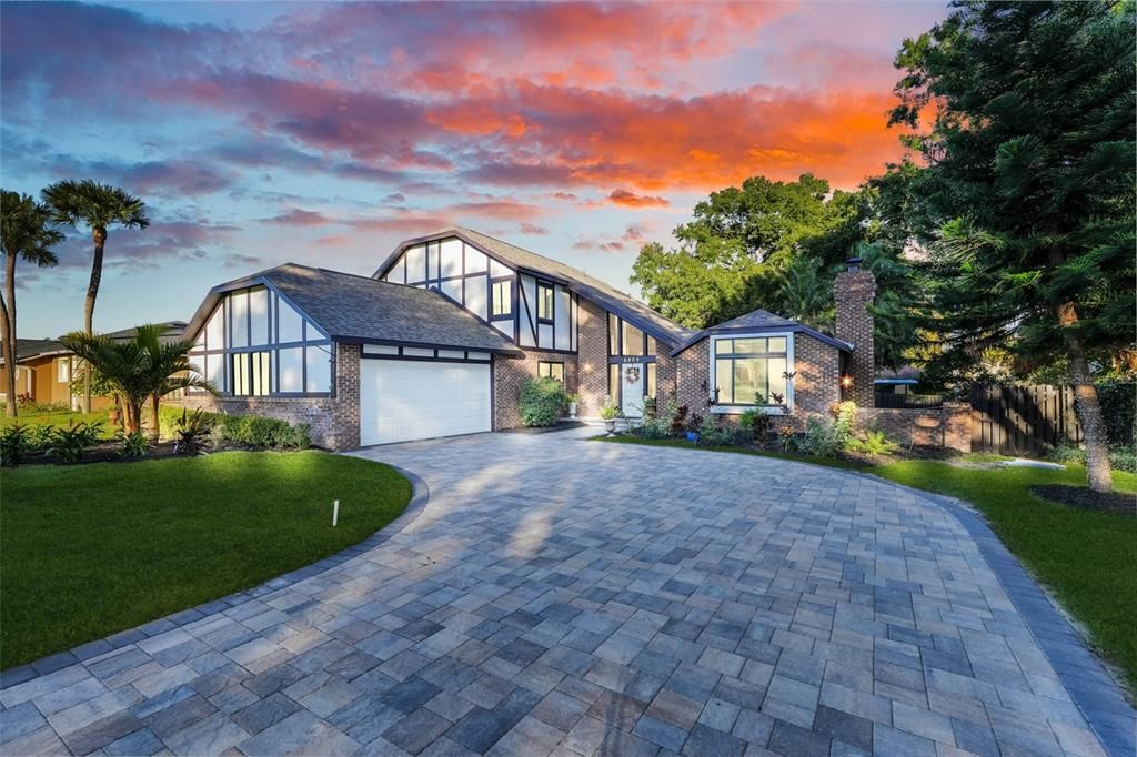 Attached, Backyard, Exterior, Facade, Brick Facade, Tudor Revival