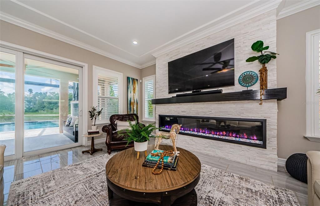 Fireplace, Interior, Living room, Recessed Lighting, Wood Texture Flooring