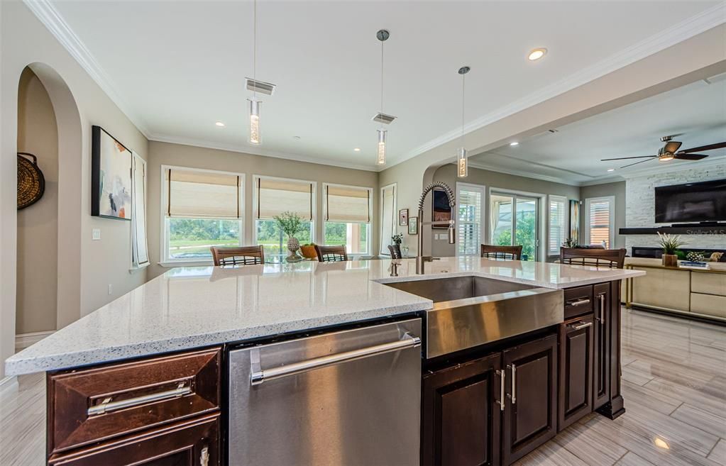 Dining room, Fireplace, Interior, Kitchen, Pendant Lights, Recessed Lighting, Stainless Steel Appliances, Wood Texture Flooring