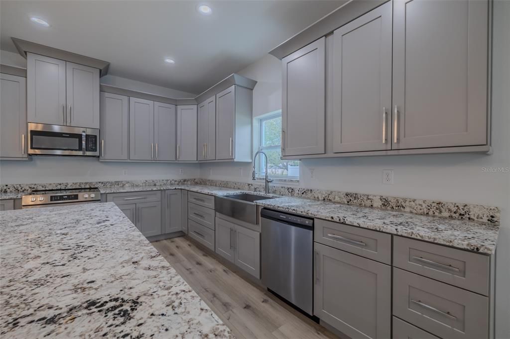 Interior, Kitchen, Recessed Lighting, Stainless Steel Appliances, Wood Texture Flooring