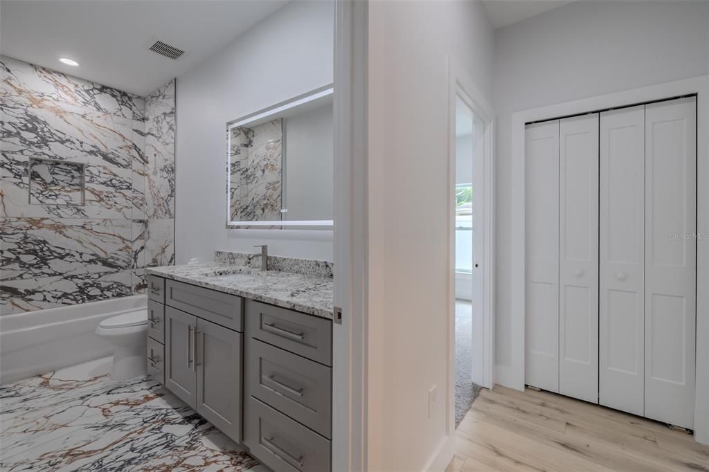 Bathroom, Interior, Marble, Marble Walls, Recessed Lighting, Wood Texture Flooring