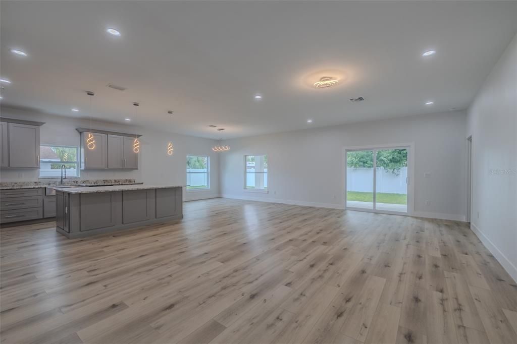 Empty room, Interior, Kitchen, Pendant Lights, Recessed Lighting, Wood Texture Flooring