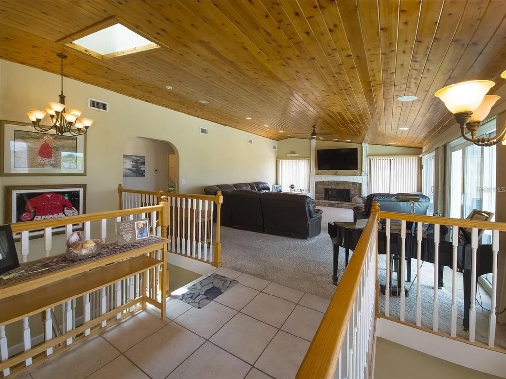 Chandelier, Fireplace, Interior, Living room, Recessed Lighting, Wooden Ceilings