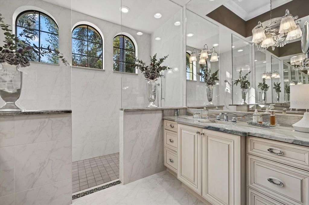 Bathroom, Dual Sink Vanities, Glass Shower, Interior, Marble, Marble Walls, Pendant Lights, Recessed Lighting