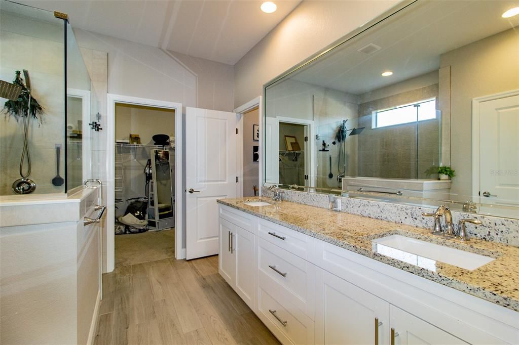 Bathroom, Dual Sink Vanities, Glass Shower, Interior, Recessed Lighting, Wood Texture Flooring
