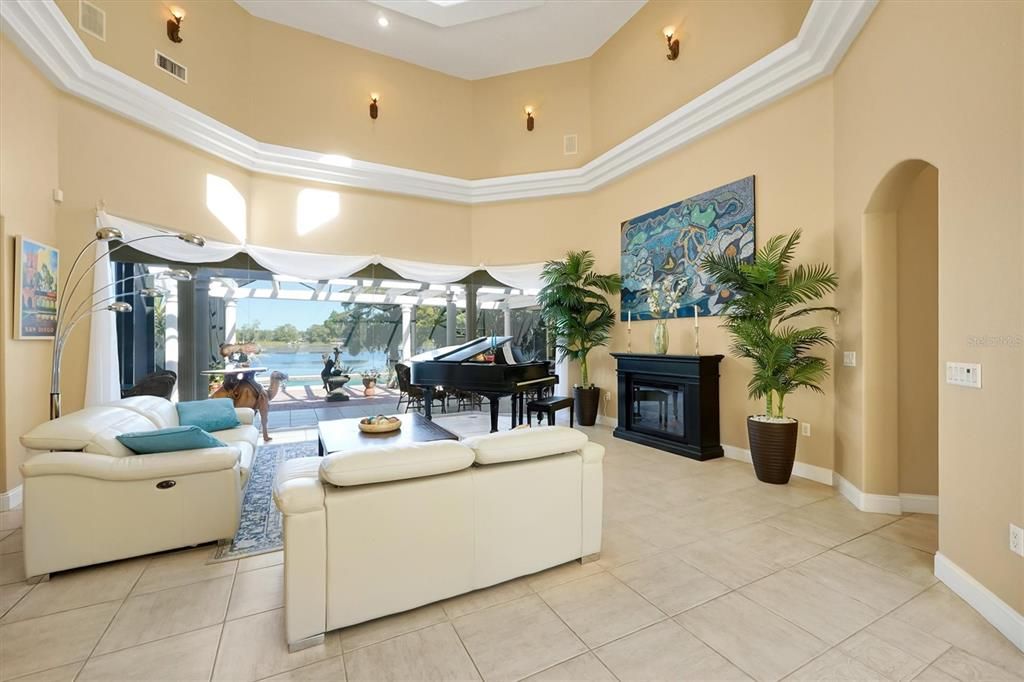 Fireplace, Interior, Living room, Piano, Recessed Lighting, Water