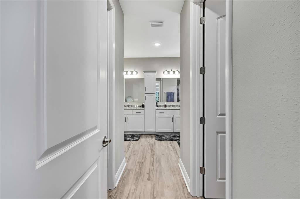 Bathroom, Dual Sink Vanities, Interior, Recessed Lighting, Wood Texture Flooring
