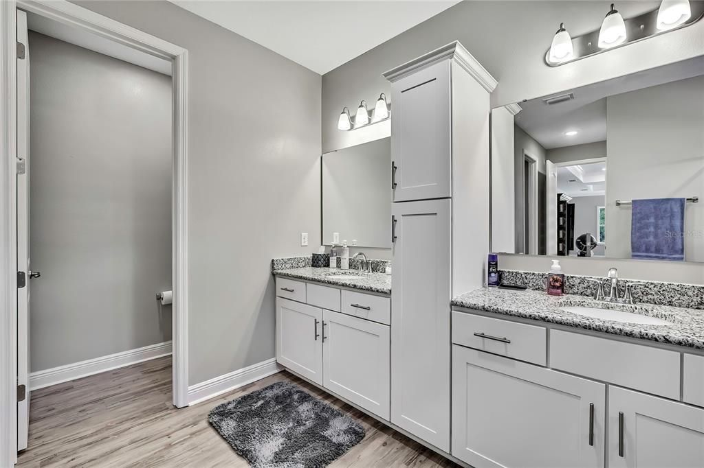 Bathroom, Dual Sink Vanities, Interior, Recessed Lighting, Wood Texture Flooring