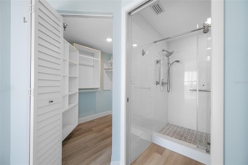 Bathroom, Glass Shower, Interior, Recessed Lighting, Walk-in Closets, Wood Texture Flooring