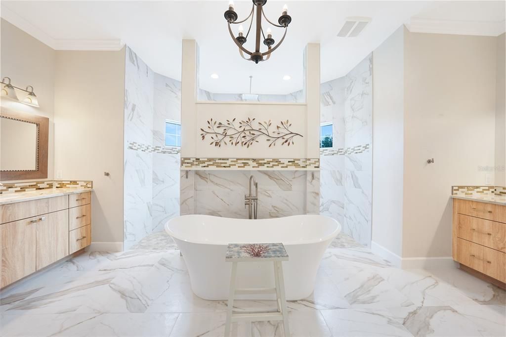 Bathroom, Chandelier, Dual Sink Vanities, Free Standing Baths, Interior, Marble, Marble Walls, Recessed Lighting