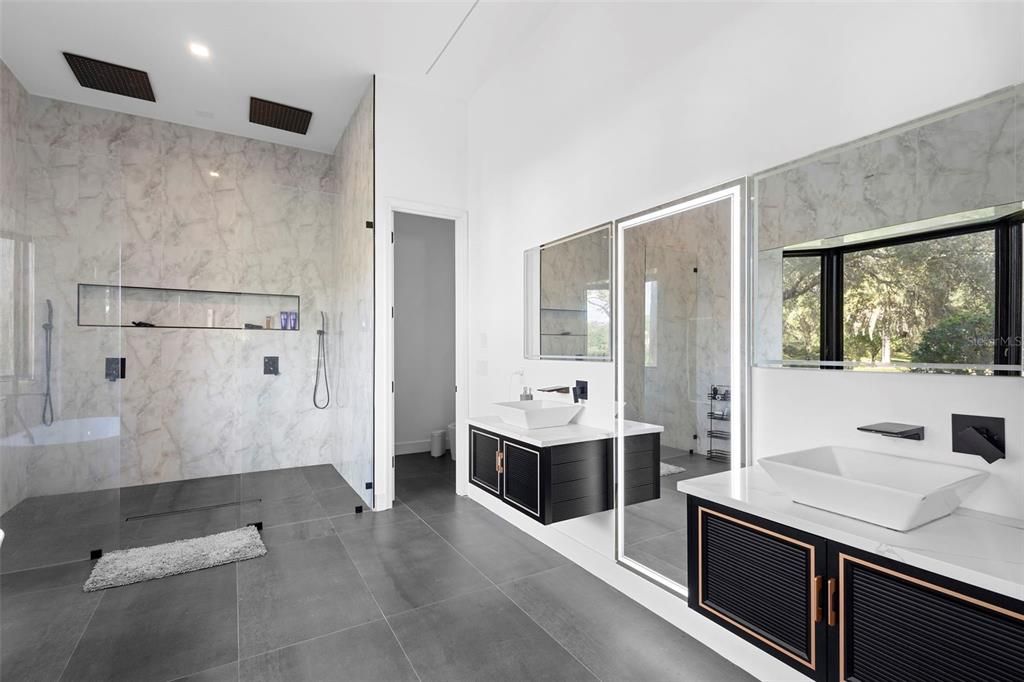 Bathroom, Dual Sink Vanities, Glass Shower, Interior, Marble Walls, Recessed Lighting