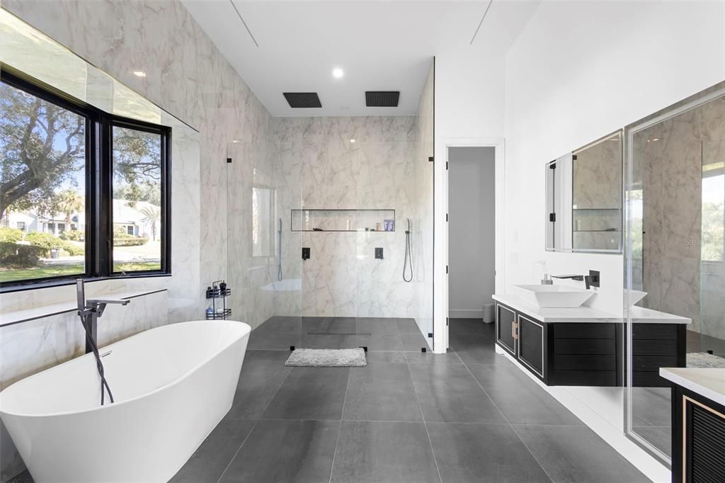 Bathroom, Dual Sink Vanities, Free Standing Baths, Glass Shower, Interior, Marble Walls, Recessed Lighting