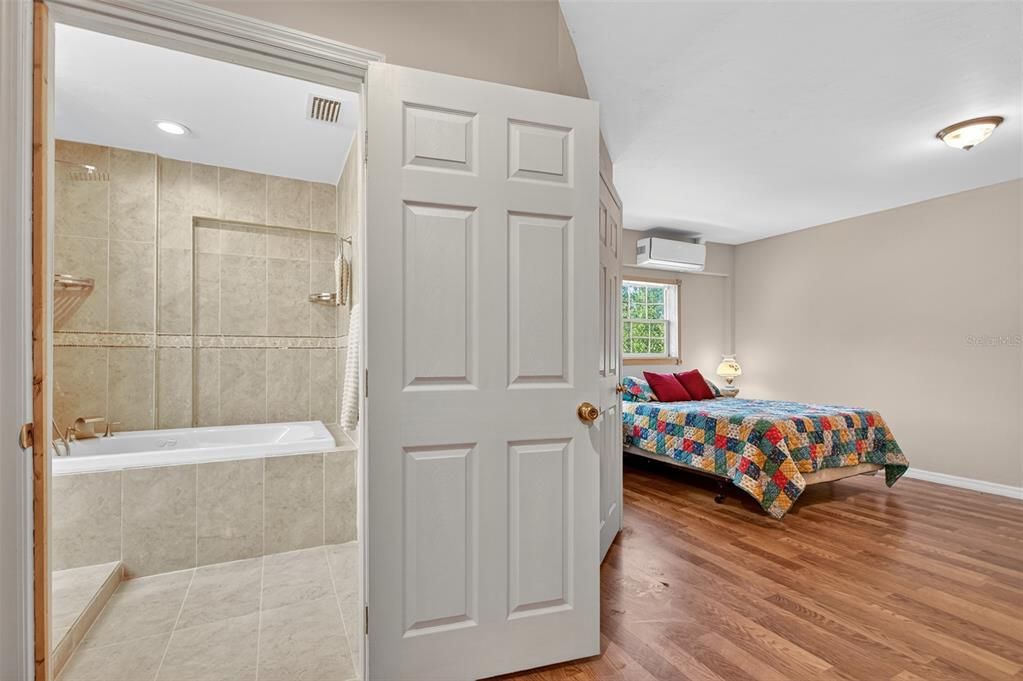 Bathroom, Bedroom, Glass Shower, Interior, Recessed Lighting, Wood Texture Flooring