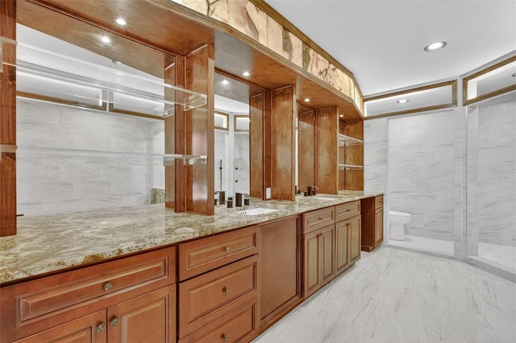 Bathroom, Dual Sink Vanities, Glass Shower, Interior, Marble, Marble Walls, Recessed Lighting