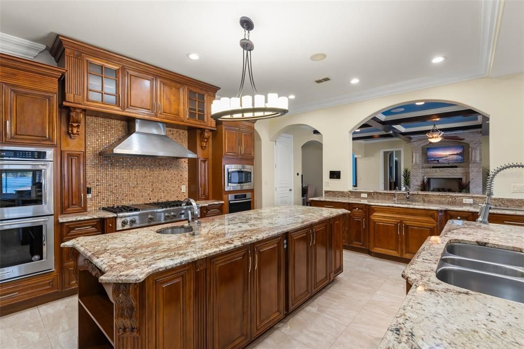 Fireplace, Interior, Kitchen, Pendant Lights, Recessed Lighting, Stainless Steel Appliances